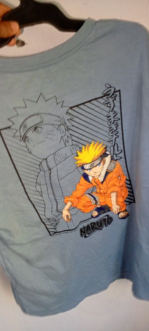 Naruto Anime Blue Graphic T-Shirt (Category: Tshirts & Polo Shirts ) located in Manila. Submitted by ezekislacl02490 (Listing ID 1468283248, Image 2). Description: - Color: Light blue - Design: Small black Naruto logo on the chest; large Naruto Uzumaki graphic with line art and Japanese text on the back - Fit & Style: Short sleeves, crew neck - Material: Comfortable, breathable cotton - Condition: Brand new / Excellent quality - Mode of Payment: 