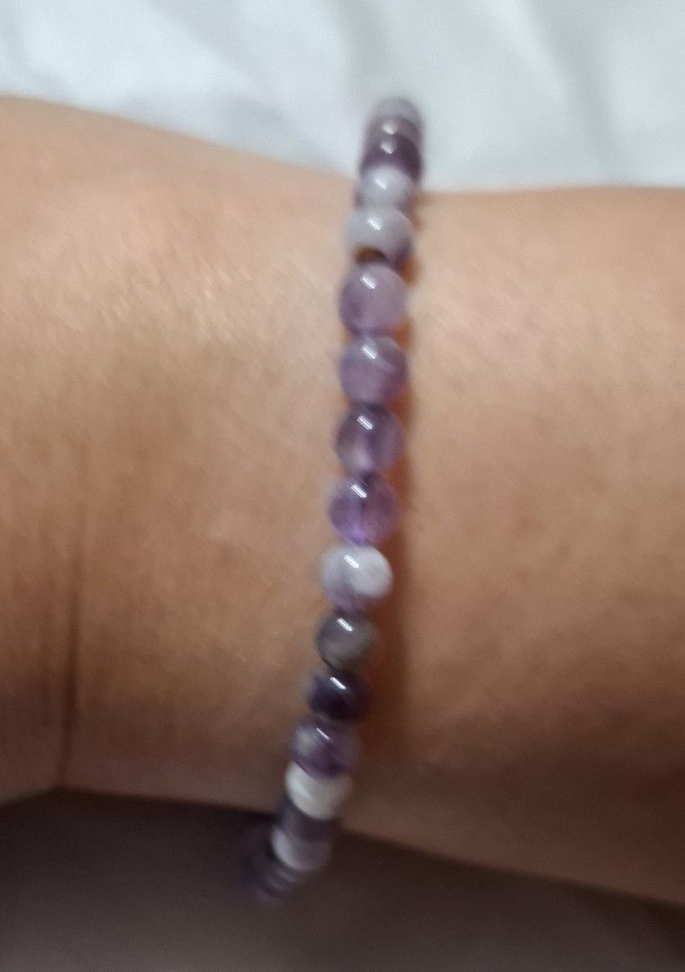 Natural Amethyst Crystal Beaded Stretch Bracelet (Category: Bracelets) located in Quezon City. Submitted by satin_heart2026 (Listing ID 1468237963, Image 1). Description: - Made with 100% natural amethyst crystals - Features a unique single white accent bead - Securely strung on durable stretch cord - Comfortable fit for most wrist sizes - Perfect for daily wear and crystal healing - made by canadian jeweler.