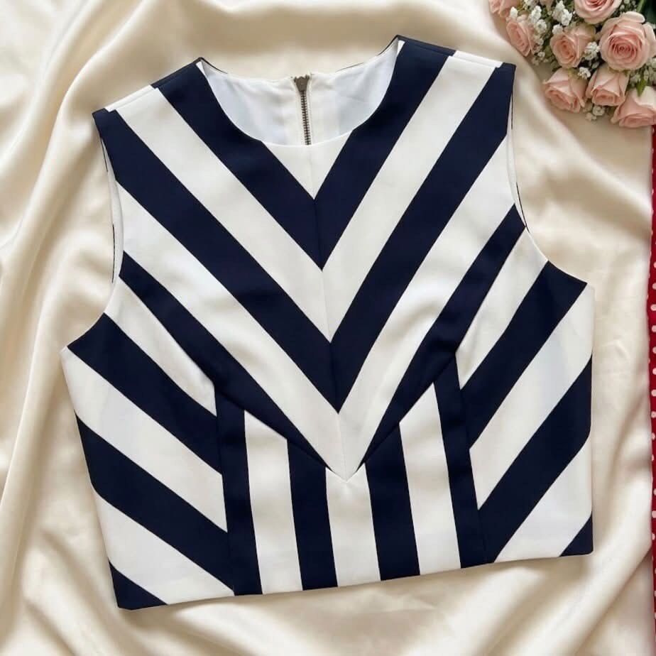 Navy blue and white striped sleeveless top (Category: Sleeveless) located in Manila. Submitted by elyvelleee (Listing ID 1468255198, Image 1). Description: Prettiest chic navy blue and white striped sleeveless top with bold diagonal pattern, minimalist elegant design, classy and sophisticated Korean-inspired piece 🤍💙 — a stylish statement top with a clean and structured appearance ♡ perfect for girls who love timeless monochrome styling with a 