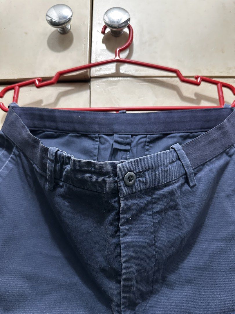 Navy Blue Casual Trousers Pants (Category: Trousers) located in Manila. Submitted by vicnoay (Listing ID 1468279026, Image 2). Description: - Color: Dark blue - Closure: Button closure with belt loops - Pockets: Front pockets and two back welt pockets with button details - Fit: Standard cut - Style: Solid color, versatile for casual or smart wear - Condition: Visible texture and slight fading from use.