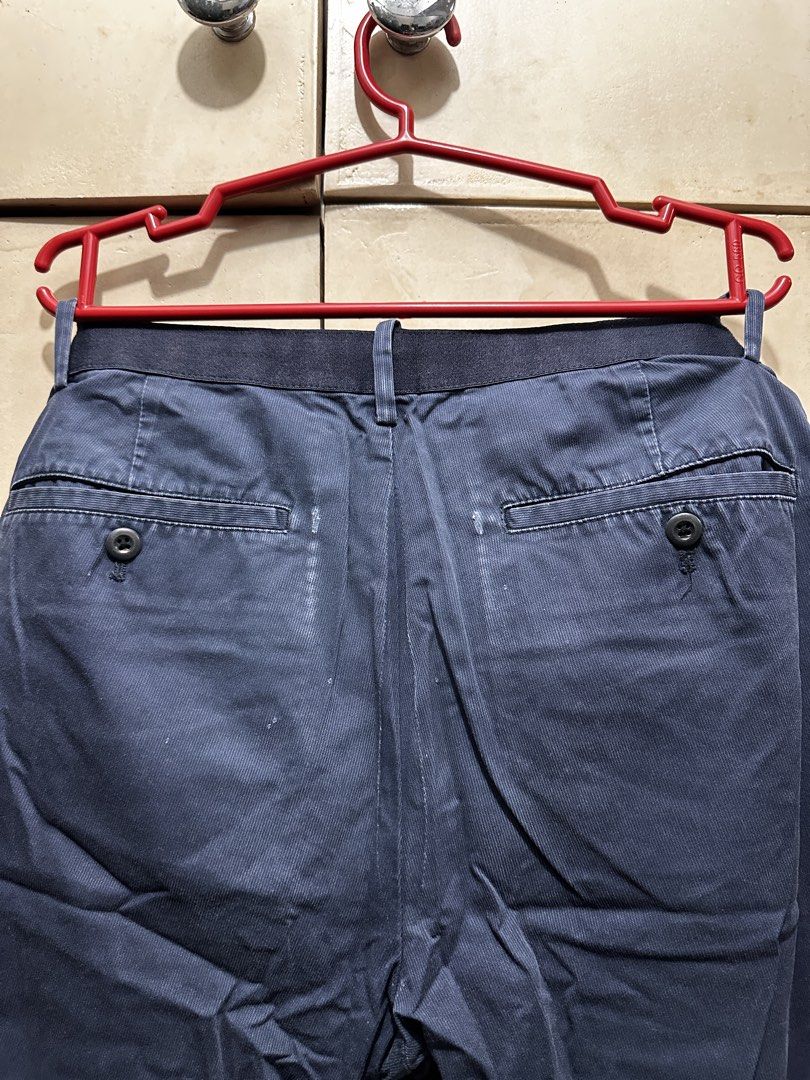 Navy Blue Casual Trousers Pants (Category: Trousers) located in Manila. Submitted by vicnoay (Listing ID 1468279026, Image 3). Description: - Color: Dark blue - Closure: Button closure with belt loops - Pockets: Front pockets and two back welt pockets with button details - Fit: Standard cut - Style: Solid color, versatile for casual or smart wear - Condition: Visible texture and slight fading from use.
