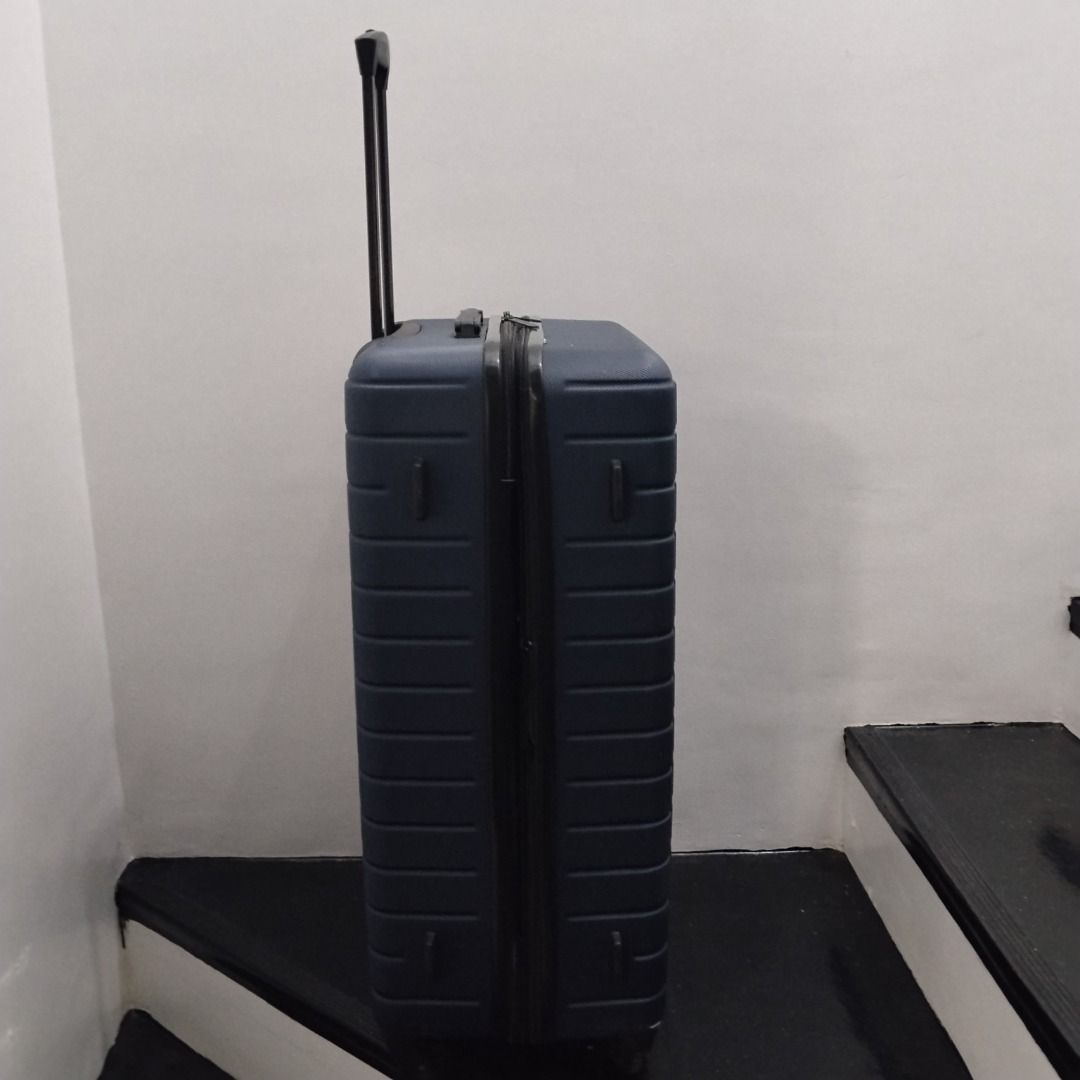 Navy blue hardside suitcase with telescopic handle (Category: Luggage) located in Cavite. Submitted by msgs_2827 (Listing ID 1468114425, Image 3). Description: For Sale: Navy blue hardside suitcase with telescopic handle Color: Navy Blue Condition: Only used once - in very good condition! Actual Measurements (including the wheels): Height: 29 inches Width: 20 inches Depth: 11 inches - Color: Solid navy blue - Type: Durable hardside luggage with r