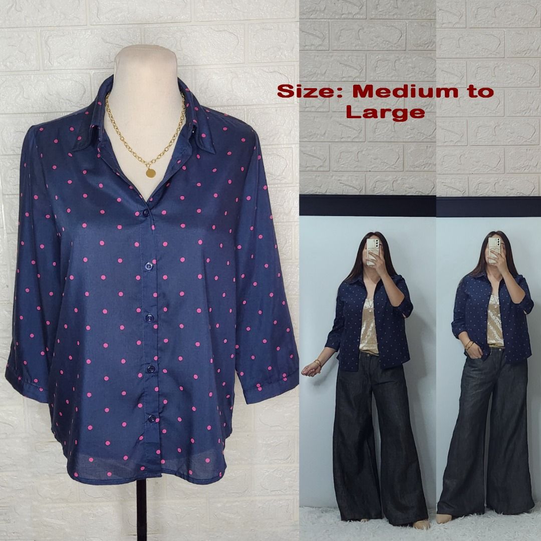 Navy Blue Pink Polka Dot Button Down Shirt (Category: Blouses) located in Quezon City. Submitted by graciejosue (Listing ID 1468060462, Image 1). Description: -Rare piece apparel at a very reasonable price and great condition!!! Washed and ready to wear. Color/Pattern: Navy blue with all-over pink polka dots - Fit: Fits Medium to Semi Large comfortably - Features: Collared neckline, front button closure, and stylish 3/4 sleeves - Fabric: Lightwei