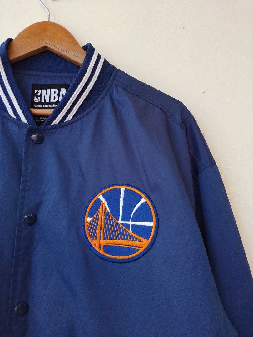 NBA Golden State Warriors Varsity/Blouson Jacket Navy (Category: Coats, Jackets and Outerwear) located in Taytay. Submitted by elegant.revival (Listing ID 1468211369, Image 2). Description: Excellent Condition No Issue Dimes 29L x 24w Size XL Color rate 9.5/10 Condition 9.5/10 Shipping Nationwide ‼️.