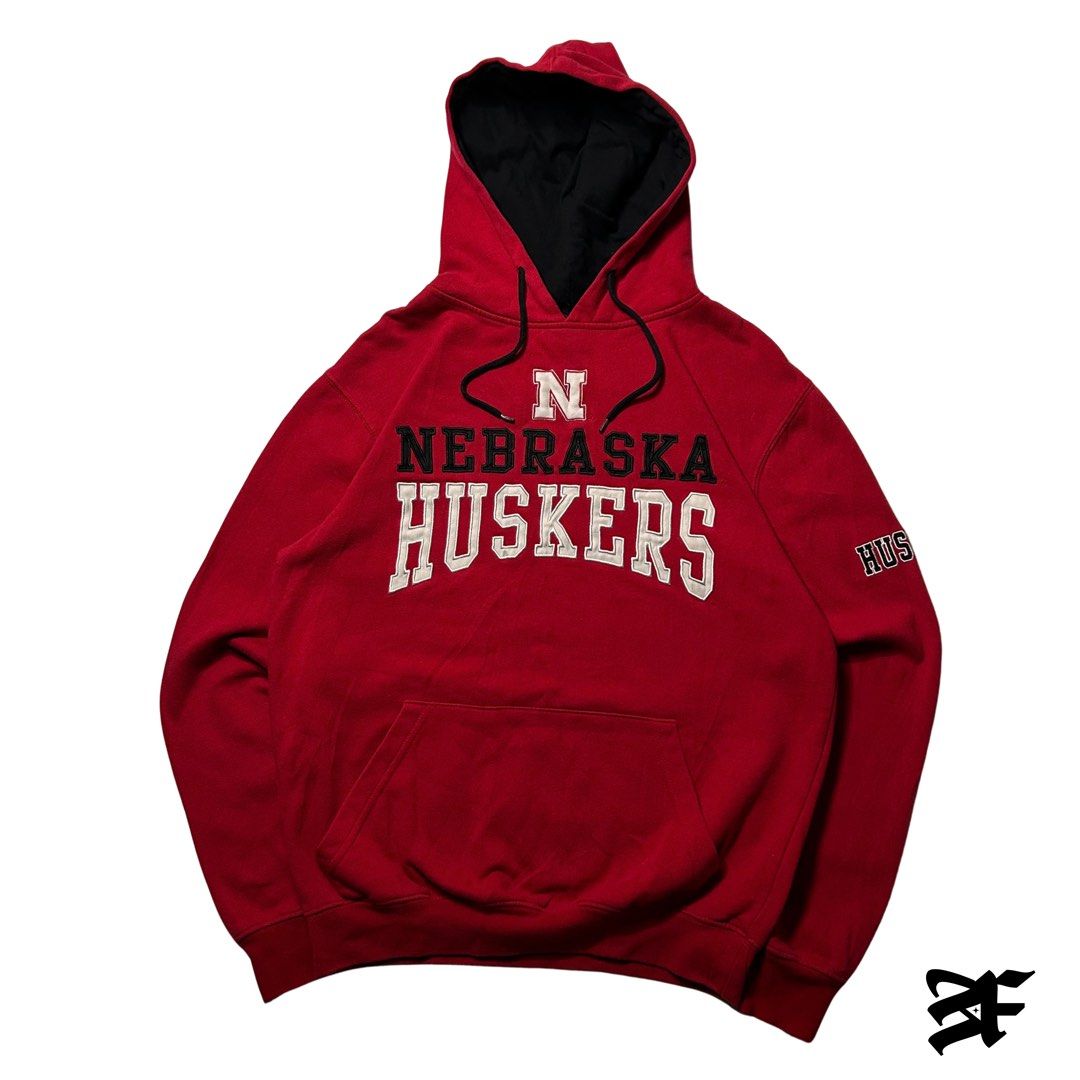 Nebraska Embroidered Hoodie (Category: Hoodies) located in Antipolo. Submitted by wvyfrnds (Listing ID 1468220033, Image 1). Description: Nebraska Embroidered Hoodie Size: M Color: Red Dimensions (Inches): Length: 24.5 Width: 21 Color Rate: 9/10 Issues - Ink stain at the back of hood 395 PLUS SF.