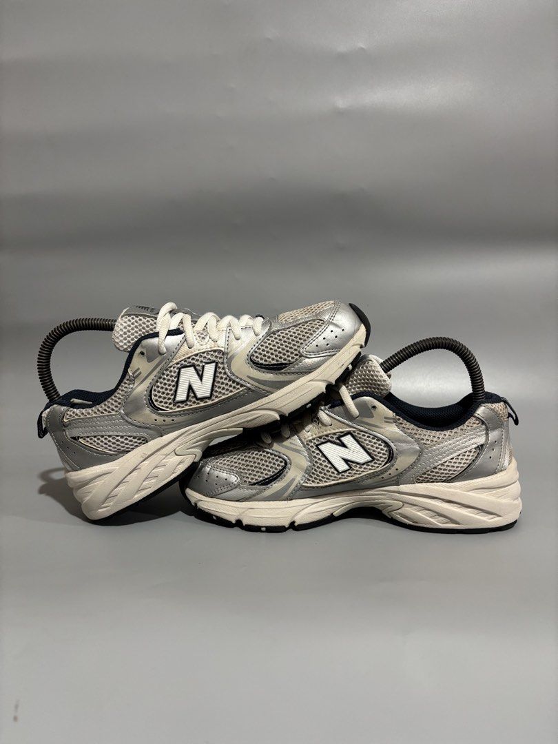 New Balance 530 Silver Metallic Navy (Category: Sneakers) located in Butuan. Submitted by shoeetasho (Listing ID 1468211387, Image 3). Description: - Model: New Balance 530 (Silver/Navy) - Size: US 6.5 Women's / EU 37.5 / 23cm - Condition: Clean outsoles, minimal wear on treads - Features: Mesh upper, metallic overlays, and comfortable ABZORB cushioning - Price: 1,500 PHP with FREE SHIPPING nationwide.