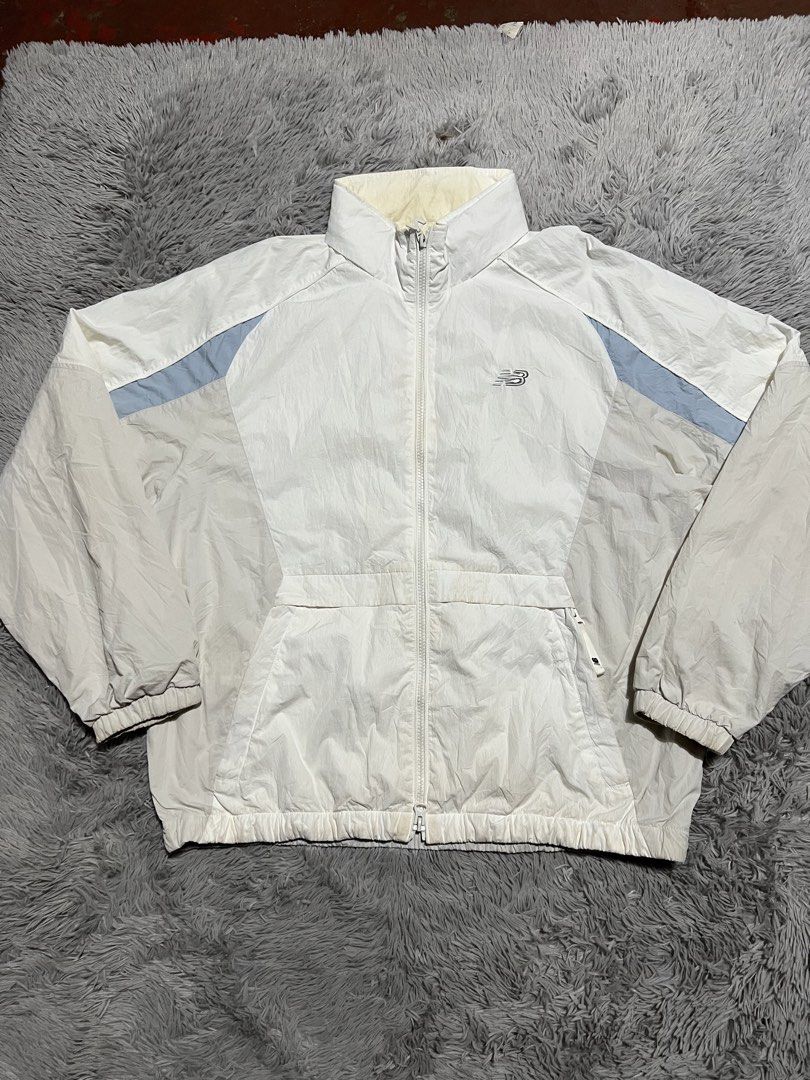 New balance packable hood windbreaker (Category: Coats, Jackets and Outerwear) located in Manila. Submitted by loreenajoc (Listing ID 1468219057, Image 2). Description: New balance packable hood windbreaker Excellent condition Large No issue Need wash.
