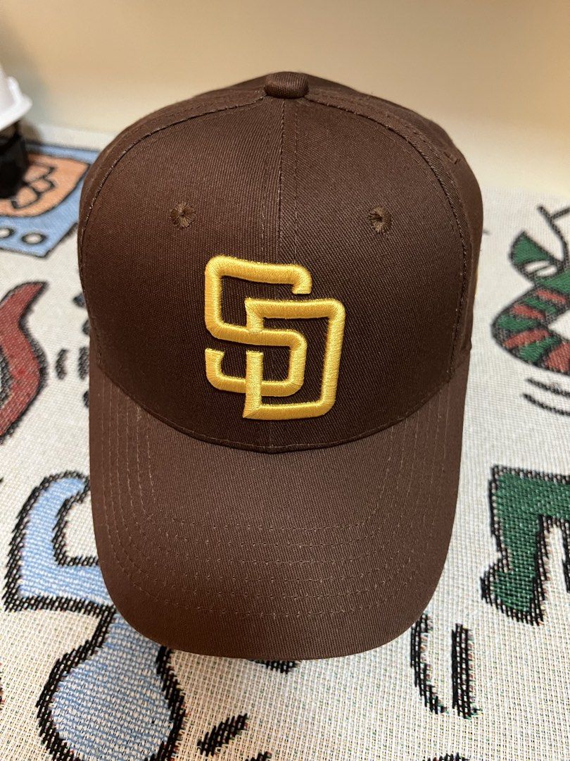 New Era SD San Diego Cap A-frame hat Adjustable (Category: Caps & Hats) located in San Fernando. Submitted by krncarts0421546 (Listing ID 1468103211, Image 1). Description: [Item Description] Color: Brown and Yellow Logo Condition: 9/10 Size: OSFA Adjustable [Mode of Payment] Strictly Gcash (Price + sf) [Mode of Delivery] J&t/LBC/Lalamove.