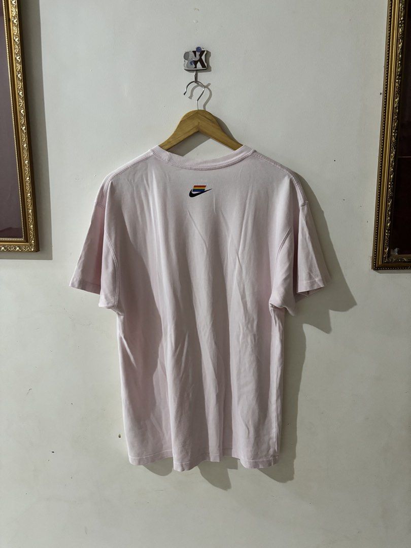 Nike ACG Rainbow Triangle Logo Pink Tee Size L (Category: Tshirts & Polo Shirts ) located in Kalibo. Submitted by mack29 (Listing ID 1468210023, Image 2). Description: - excellent - Color: Light Pink - Size: Large - Design: Large rainbow triangle logo on front, small rainbow tag and swoosh on back collar - Fit: Regular fit crewneck - Style: Casual streetwear - Condition: Good pre-owned condition - Mode of Payment: GCash Excellent .