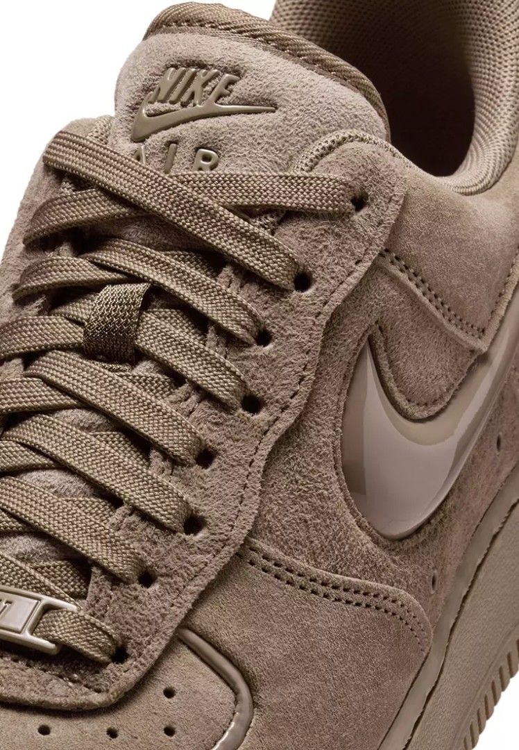 Nike Air Force 1 Low '07 Mink Brown (Category: Sneakers) located in Manila. Submitted by steverrive65874 (Listing ID 1468204944, Image 2). Description: The Nike Air Force 1 Low '07 Mink Brown reimagines a Nike classic in a sophisticated earthy hue. Created in 1982 by Bruce Kilgore, this iconic silhouette made its mark on basketball history before conquering the streets and becoming a global streetwear icon. This women's version features a mink br