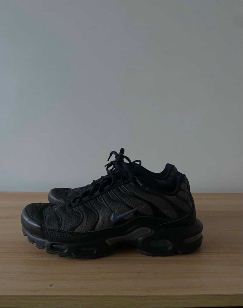 Nike Air Max Plus (TN / Tuned Air) (Category: Sneakers) located in Manila. Submitted by lebiii (Listing ID 1468196927, Image 3). Description: Authentic Nike Air Max Plus (TN) in a sleek Black/Dark Grey colorway featuring classic Tn heel logos. In pre-owned condition with air units intact and ready for daily wear. DM for inquiries, shipping, or offers!.