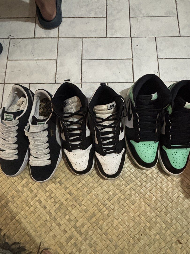 Nike and Puma Set (Category: Sneakers) located in Quezon City. Submitted by lovyan (Listing ID 1468068927, Image 1). Description: Nike Jordan 1 high Green Glow Nike Dunk High Panda Puma Suede XXL black Puma Suede needs cleaning Nike Dunk Panda has small paint smudge on its side For Meetup at QC/SM North Buyer shoulders shipping.