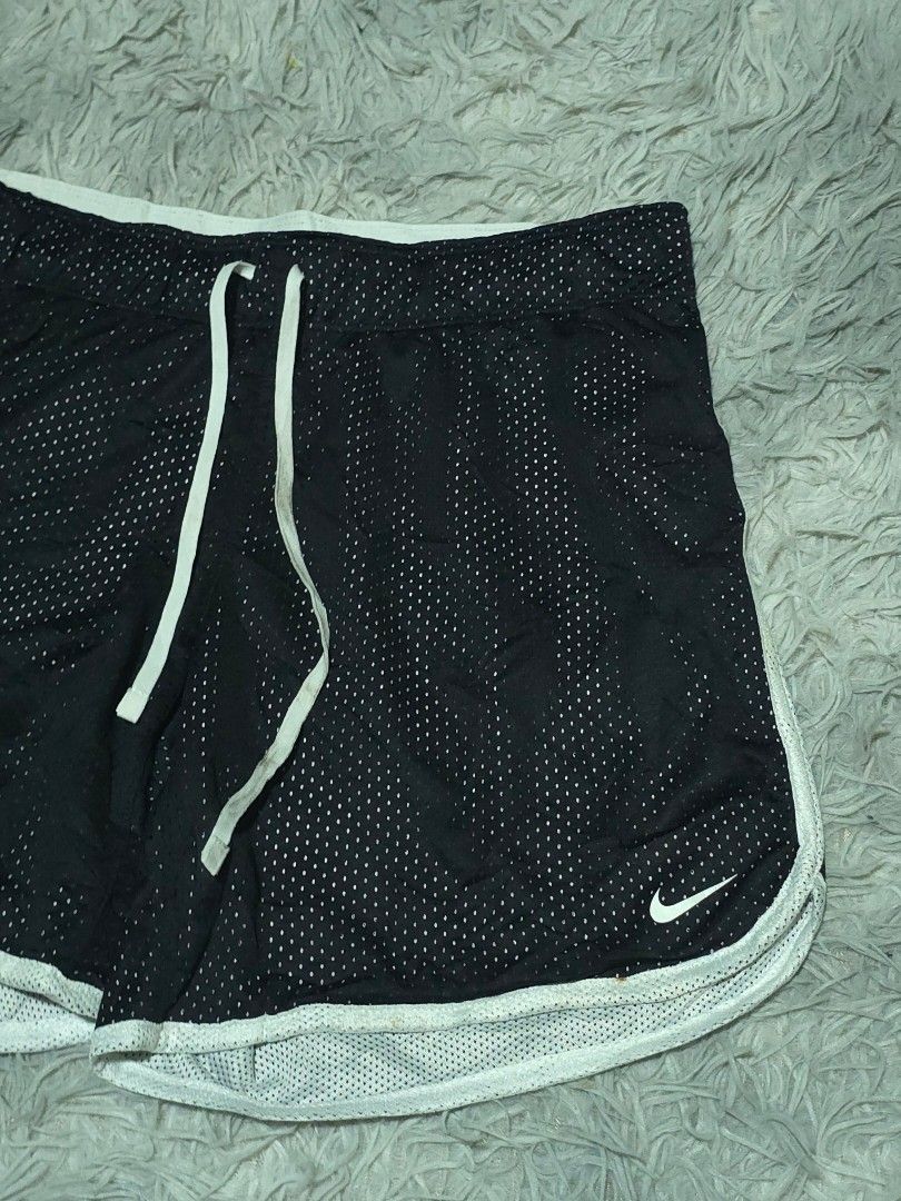 Nike Dri-FIT Black Mesh Shorts (Category: Shorts) located in Abulug. Submitted by humanwhosellthings (Listing ID 1468183201, Image 2). Description: - Brand: Nike ✅Excellent Condition ✅Issue: none ▫️Waist Size: 28-34 ▫️Length: 12.5 - Style: Dri-FIT Mesh Shorts (Style Code: 642673-010) - Size: Small (S) - Color: Black with white contrast trim - Features: Breathable all-over mesh texture, convenient side pockets, and white drawstring waist with icon