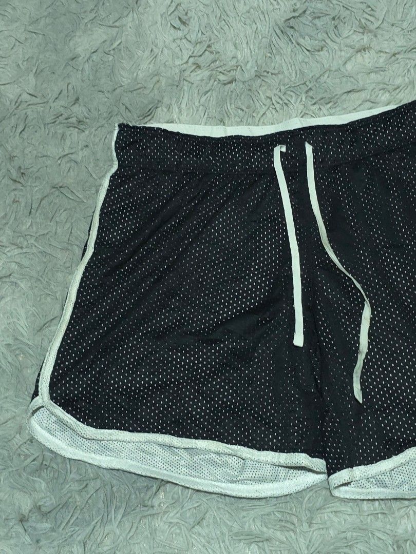 Nike Dri-FIT Black Mesh Shorts (Category: Shorts) located in Abulug. Submitted by humanwhosellthings (Listing ID 1468183201, Image 3). Description: - Brand: Nike ✅Excellent Condition ✅Issue: none ▫️Waist Size: 28-34 ▫️Length: 12.5 - Style: Dri-FIT Mesh Shorts (Style Code: 642673-010) - Size: Small (S) - Color: Black with white contrast trim - Features: Breathable all-over mesh texture, convenient side pockets, and white drawstring waist with icon