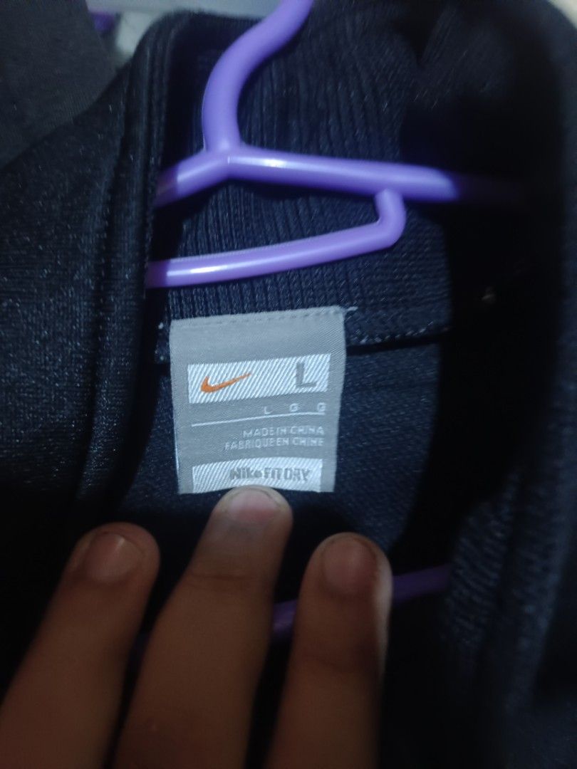 Nike Fit Dry Black White Track Jacket Size L (Category: Coats, Jackets and Outerwear) located in Manila. Submitted by rhoydyyy (Listing ID 1468136730, Image 2). Description: - Brand: Nike - Style: Track Jacket / Full Zip - Color: Black and White - Size: Large (L) - Material/Tech: Nike Fit Dry fabric for sweat-wicking comfort - Details: Embroidered Swoosh logo on chest, white paneling on shoulders and arms - Condition: Good zip action, excellent f
