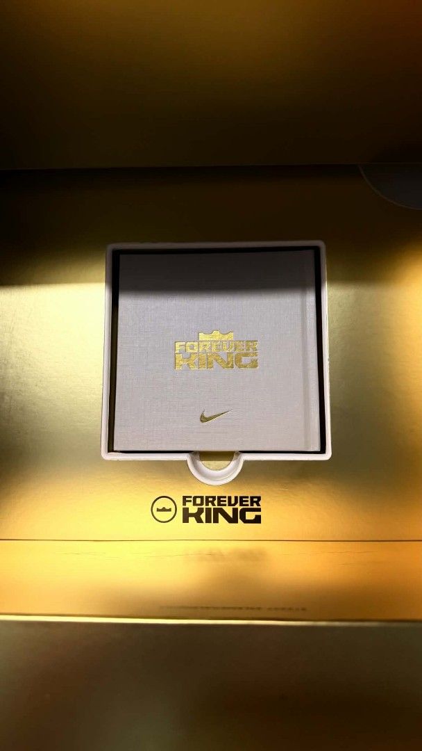 Nike LeBron James Forever King Special Edition Box (Category: Sneakers) located in Subic. Submitted by preloved_luxurybags (Listing ID 1468075504, Image 2). Description: BOX AND BOOKLET ONLY! - Special edition Nike LeBron James 23 Forever King collector box & booklet - Includes large gold presentation packaging - Comes with exclusive tech booklet (ZoomX & carbon fiber plate details) - Features official timeline history of LeBron.