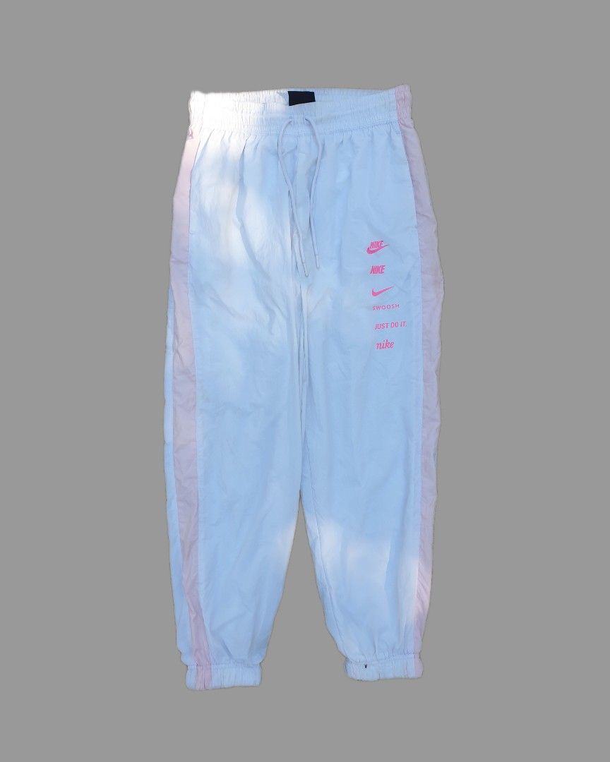 Nike Multi Logo Trackpants (Category: Joggers) located in Bani. Submitted by thriftmaggots.ph (Listing ID 1468079313, Image 2). Description: Nike Multi Logo Trackpants Claim for 600php + Shipping fee Size medium Waistline 28-31 Length 36 No issue 9/10 Condition Payment first via gcash/maribank Pass to cod/cop Location Pangasinan, luzon.