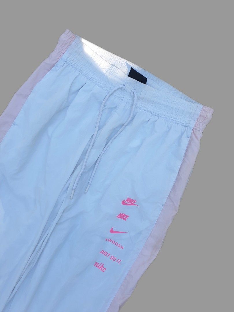 Nike Multi Logo Trackpants (Category: Joggers) located in Bani. Submitted by thriftmaggots.ph (Listing ID 1468079313, Image 3). Description: Nike Multi Logo Trackpants Claim for 600php + Shipping fee Size medium Waistline 28-31 Length 36 No issue 9/10 Condition Payment first via gcash/maribank Pass to cod/cop Location Pangasinan, luzon.