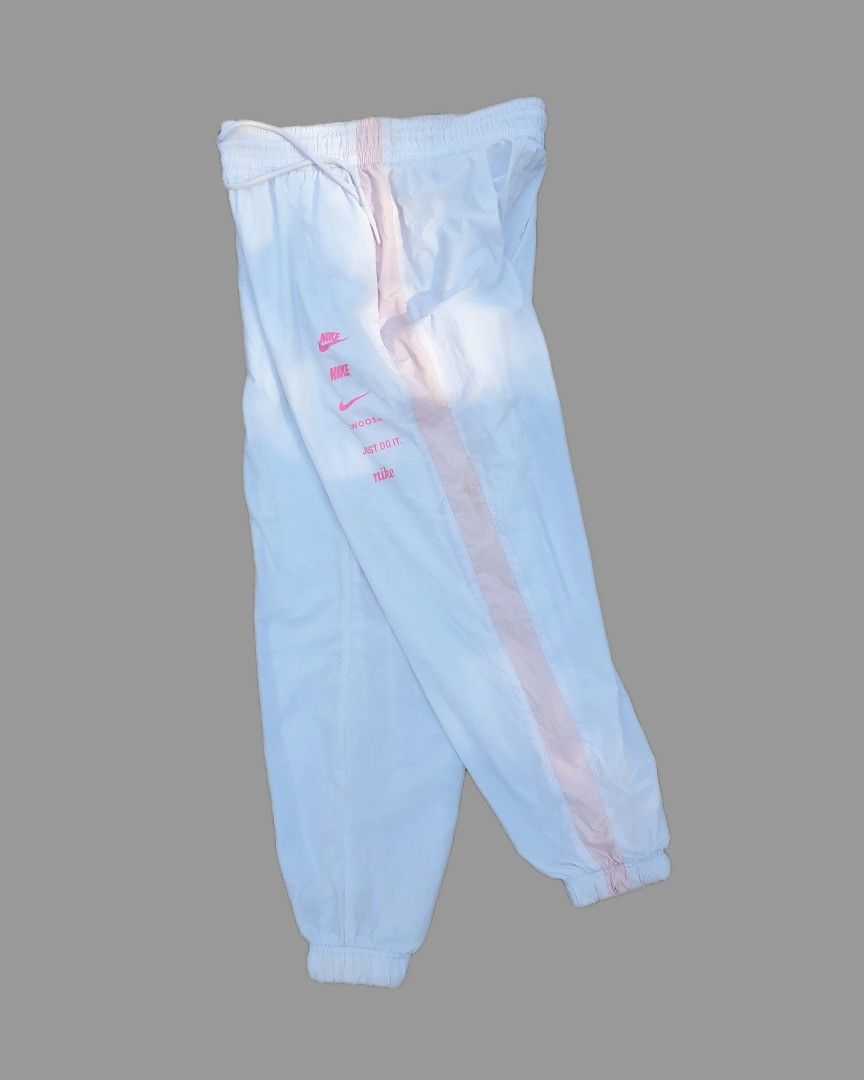 Nike Multi Logo Trackpants (Category: Joggers) located in Bani. Submitted by thriftmaggots.ph (Listing ID 1468079313, Image 1). Description: Nike Multi Logo Trackpants Claim for 600php + Shipping fee Size medium Waistline 28-31 Length 36 No issue 9/10 Condition Payment first via gcash/maribank Pass to cod/cop Location Pangasinan, luzon.