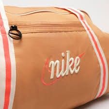 Nike Pink Duffle Gym Bag (Category: Shoulder Bags) located in Mandaluyong City. Submitted by swiftbird_ed6c34 (Listing ID 1468101766, Image 2). Description: - Brand new authentic Nike duffle bag in a trendy soft pink shade - Spacious main compartment with a convenient interior zippered pocket - Front zip pocket featuring a stylish circular pull for easy access - Comfortable striped shoulder straps and a fully adjustable crossbody strap - Features