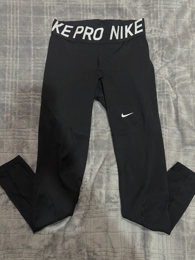 Nike Pro Dri-FIT Black Leggings (Category: Activewear) located in Bulacan. Submitted by richelleregala (Listing ID 1468078991, Image 1). Description: - Brand: Nike Pro - Item: Dri-FIT Leggings - Color: Black - Size: Medium (M) - Condition: Excellent / Like New - Features: Moisture-wicking fabric, elastic waistband with repeating Nike Pro logo, and signature white swoosh on the left leg - Ideal for: Gym workouts, running, training, and activewear 
