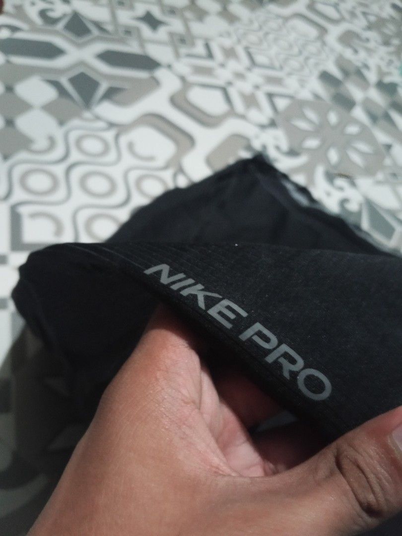 Nike Pro Therma-Fit Black Training Pants Size S (Category: Joggers) located in Lingayen. Submitted by rahzzelula73279 (Listing ID 1468283242, Image 2). Description: Nike Pro Therma-Fit training pants in black. Size S label inside. Elastic waistband with drawstrings. Ankle zippers on both cuffs for easy on and off. Nike swoosh logo printed on the upper leg. Material keeps you warm during workouts. Made in China..