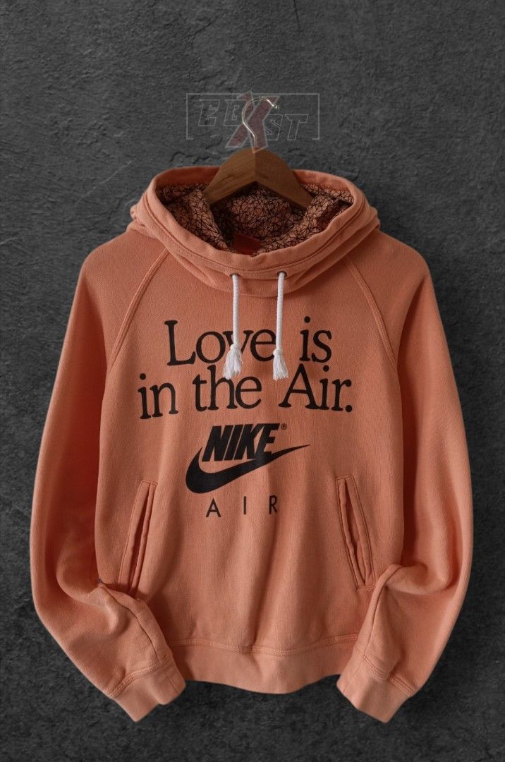 NIKE RU FUNNEL HOODIE JACKET (Category: Coats, Jackets and Outerwear) located in Baguio. Submitted by ebxst_thrift (Listing ID 1468236553, Image 2). Description: NIKE RU FUNNEL HOODIE JACKET •Size: M-L ft. •Brand: NIKE •Color: Pastel Orange •Best fit for Womens •Excellent condition Please manage your expectations: All items are thrifted/preloved. Minor signs of previous use may be present, however these do not affect wearability unless otherwise 