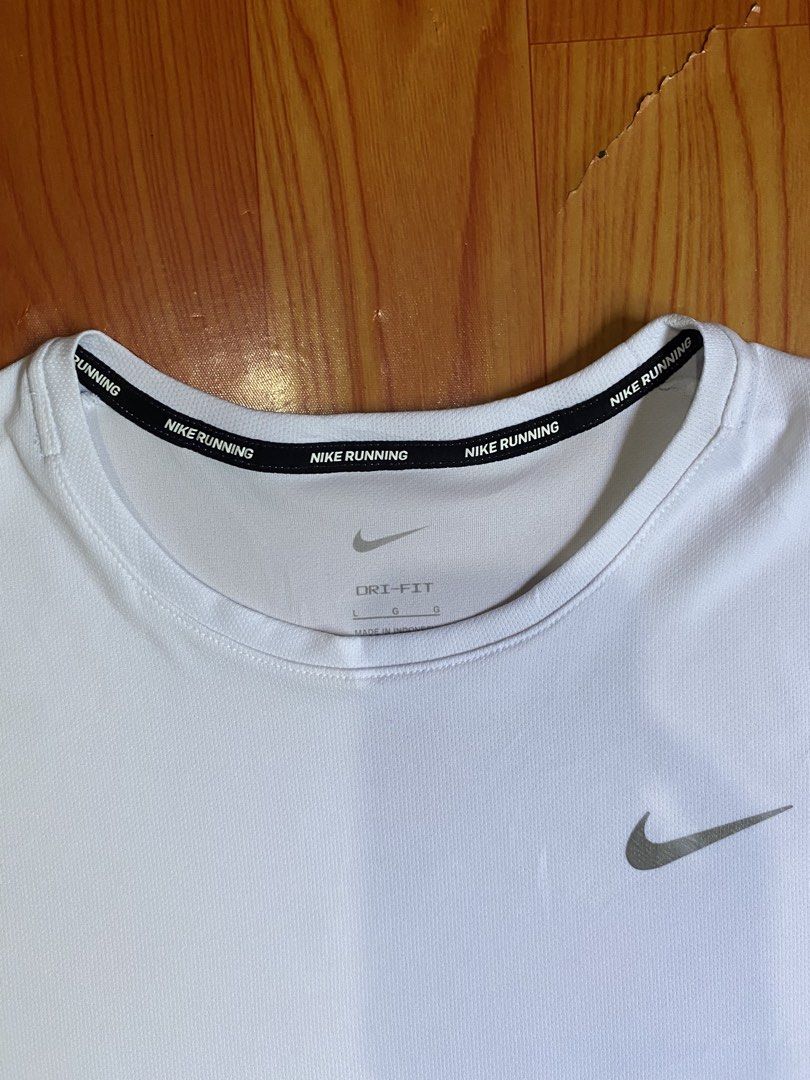 Nike running shirt drifit (Category: Activewear) located in Cebu City. Submitted by jerianix (Listing ID 1468191239, Image 3). Description: Nike running shirt drifit Size large W21.5 L27.5 Excellent condition No issues .