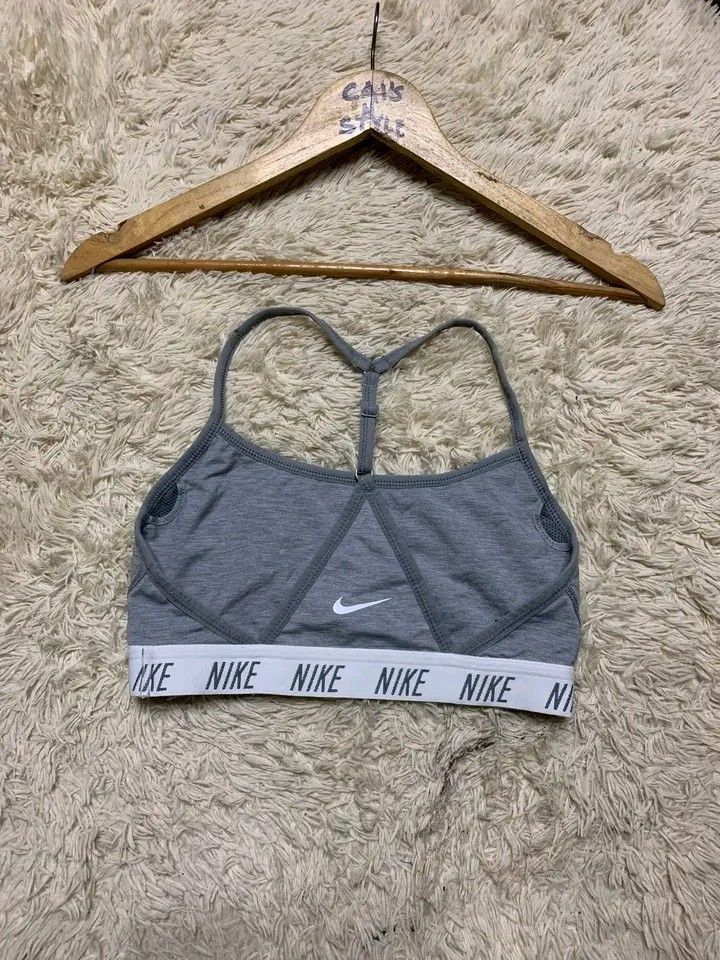Nike Sports bra (Category: Activewear) located in Lianga. Submitted by legitseller12345678 (Listing ID 1468227142, Image 3). Description: NIKE Swoosh Racerback Sports Bra📌 Like new Size small on tag Solid nito madam Mine 300 plus sf.