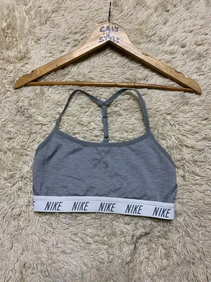 Nike Sports bra (Category: Activewear) located in Lianga. Submitted by legitseller12345678 (Listing ID 1468227142, Image 2). Description: NIKE Swoosh Racerback Sports Bra📌 Like new Size small on tag Solid nito madam Mine 300 plus sf.