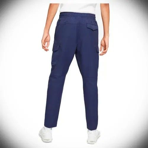 Nike Sportswear Unlined Utility Woven Pants (Category: Jeans) located in Manila. Submitted by liliaplay (Listing ID 1468098730, Image 2). Description: Authentic! Pre-loved Imported 5 pockets wind proof semi lightweight and thick engraved brand on snap buttons engraved brand on zipper goods for casual wear too Unisex size: 28-32 hem/rise: 12 length: 38 leghole: 7.5 No Issue! just cut wash tag Lowered to its negotiable price Payment 1st Shipped.