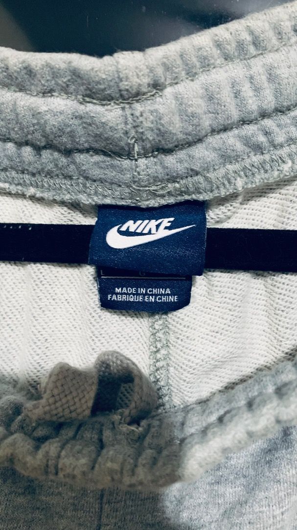 Nike Sweat Pants (Light Grey) (Category: Joggers) located in Taguig. Submitted by reused.unused (Listing ID 1468196006, Image 3). Description: Nike Sweat Pants (Light Grey) Embroidered Swoosh (White) L on Tag 38in to 40in width (waist) 42.5in length (waist to hem) 9in width (zippered leg opening) Issue/s: signs of usage -refer to photos for actual condition -refer to close up photo for actual color -pre-loved item so signs of usage is expected -f