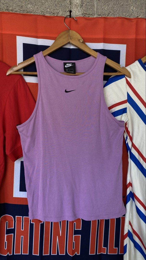Nike Tank RIB (Category: Activewear) located in Balete. Submitted by shimien02 (Listing ID 1468075413, Image 1). Description: Excellent condition color rate 9.8 Medium-Large.