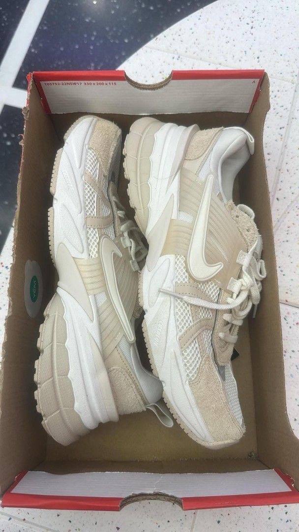 Nike V2K Run Summit White Coconut Milk Sneakers (Category: Sneakers) located in Pasig City. Submitted by bolddeer_2ab1c6 (Listing ID 1468227607, Image 1). Description: - Model: Nike V2K Run - Colorway: Summit White / Coconut Milk - Design: Chunky retro style with breathable mesh panels and hairy suede overlays - Details: Creamy neutral tones, white laces, padded collars - Packaging: Comes in the original branded red shoebox - Condition: Brand new