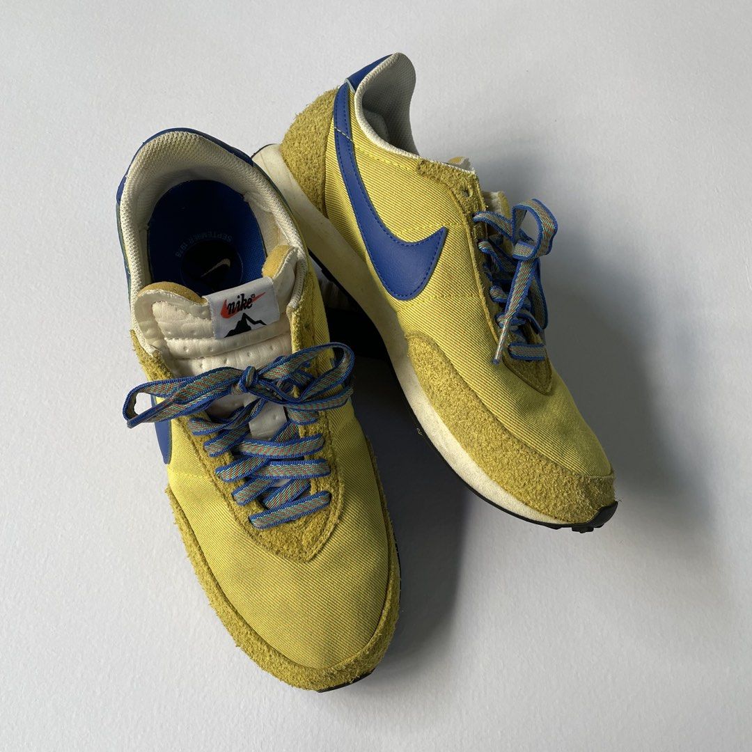 Nike Waffle Trainer 2 SD (Category: Sneakers) located in Manila. Submitted by sydge_ (Listing ID 1468136196, Image 1). Description: - Style: Retro runner, perfect for daily rotation - Colorway: Striking yellow and blue with blue and orange patterned laces - Materials: Textured suede overlays mixed with breathable fabric - Details: Iconic blue swoosh, NIK2 branding at the heel, and special text markings on blue insoles - Size: US 9.5.