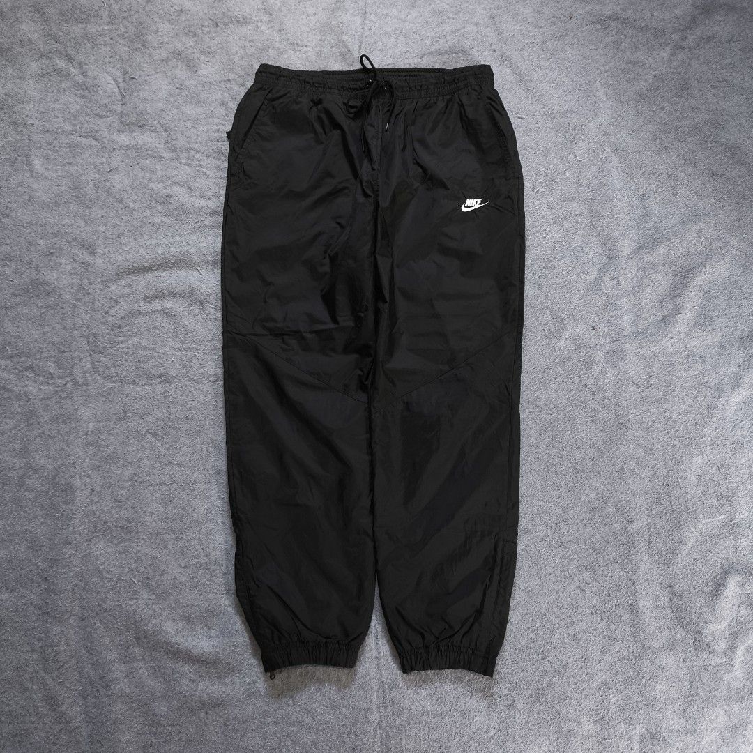 Nike Windrunner Lined Track Panta (Category: Activewear) located in Manila. Submitted by shykes_26 (Listing ID 1468113248, Image 1). Description: Dimensions: Waist - 34-42 (XXL on tag) Length - 38.5 Thigh - 15. Leg open - 6 Issues: Sign of use.