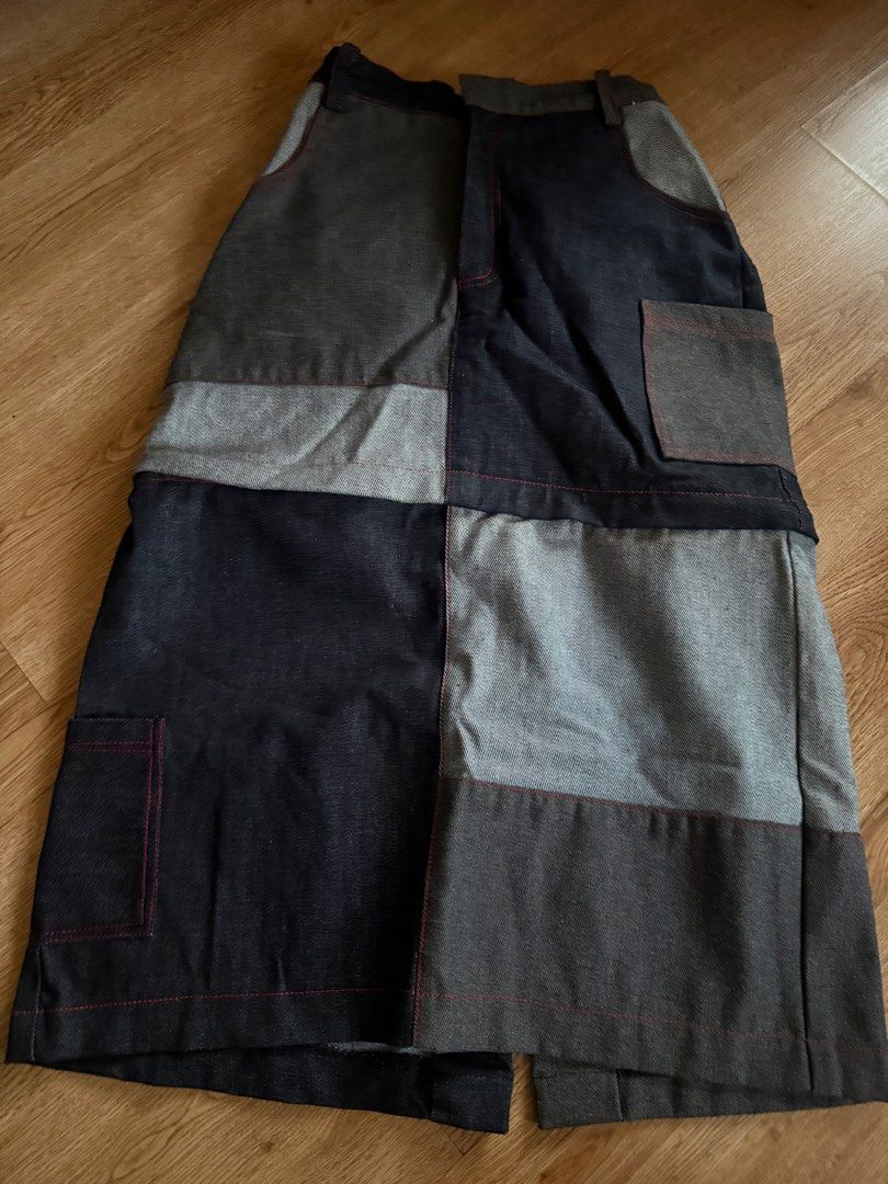 Nin and Yang PATCHWORK CONVERTIBLE DENIM SKIRT (Category: Skirts) located in Las Pinas. Submitted by coolthreadz (Listing ID 1468168897, Image 3). Description: 🖤 Nin and Yang PATCHWORK CONVERTIBLE DENIM SKIRT 🏷️ Brand: Nin and Yang (Made in the Philippines) 📏 Size: Small (Garterized) W:25-28 🎨 Color: Dark Blue, Gray & Black Patchwork ✨ Details: * Unique vintage patchwork denim design * 2-in-1 convertible skirt! Can be worn short or long * Det