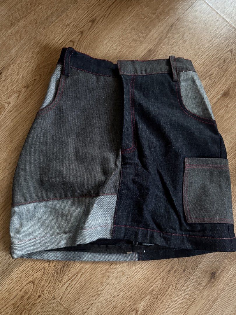 Nin and Yang PATCHWORK CONVERTIBLE DENIM SKIRT (Category: Skirts) located in Las Pinas. Submitted by coolthreadz (Listing ID 1468168897, Image 1). Description: 🖤 Nin and Yang PATCHWORK CONVERTIBLE DENIM SKIRT 🏷️ Brand: Nin and Yang (Made in the Philippines) 📏 Size: Small (Garterized) W:25-28 🎨 Color: Dark Blue, Gray & Black Patchwork ✨ Details: * Unique vintage patchwork denim design * 2-in-1 convertible skirt! Can be worn short or long * Det