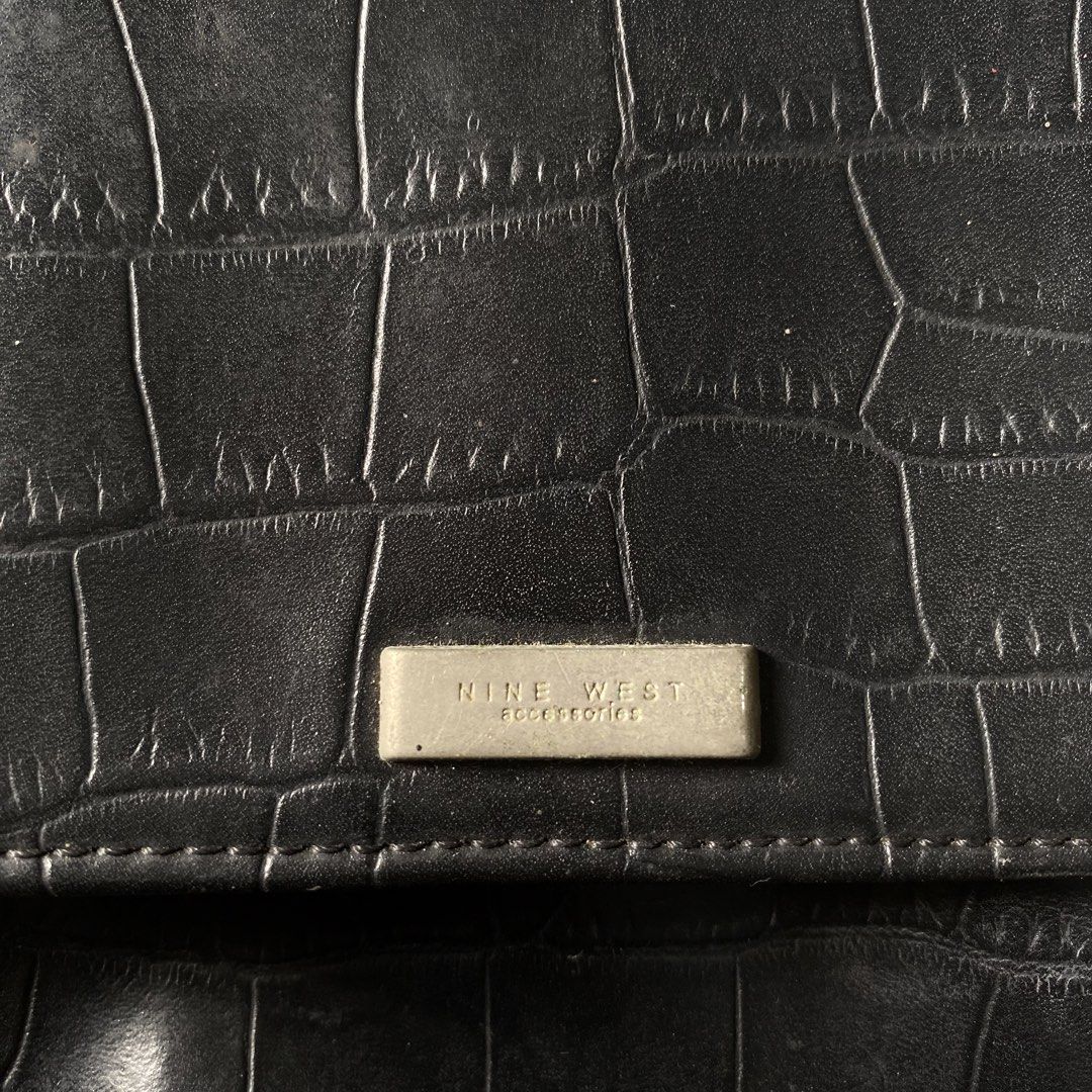 nine west sling bag (Category: Cross-body Bags) located in Manila. Submitted by thriftlangs_ig (Listing ID 1468184136, Image 2). Description: need wash sa loob lang and yung magnet, yung mismong brand medyo iba na kulay hindi na ganon katingkad….