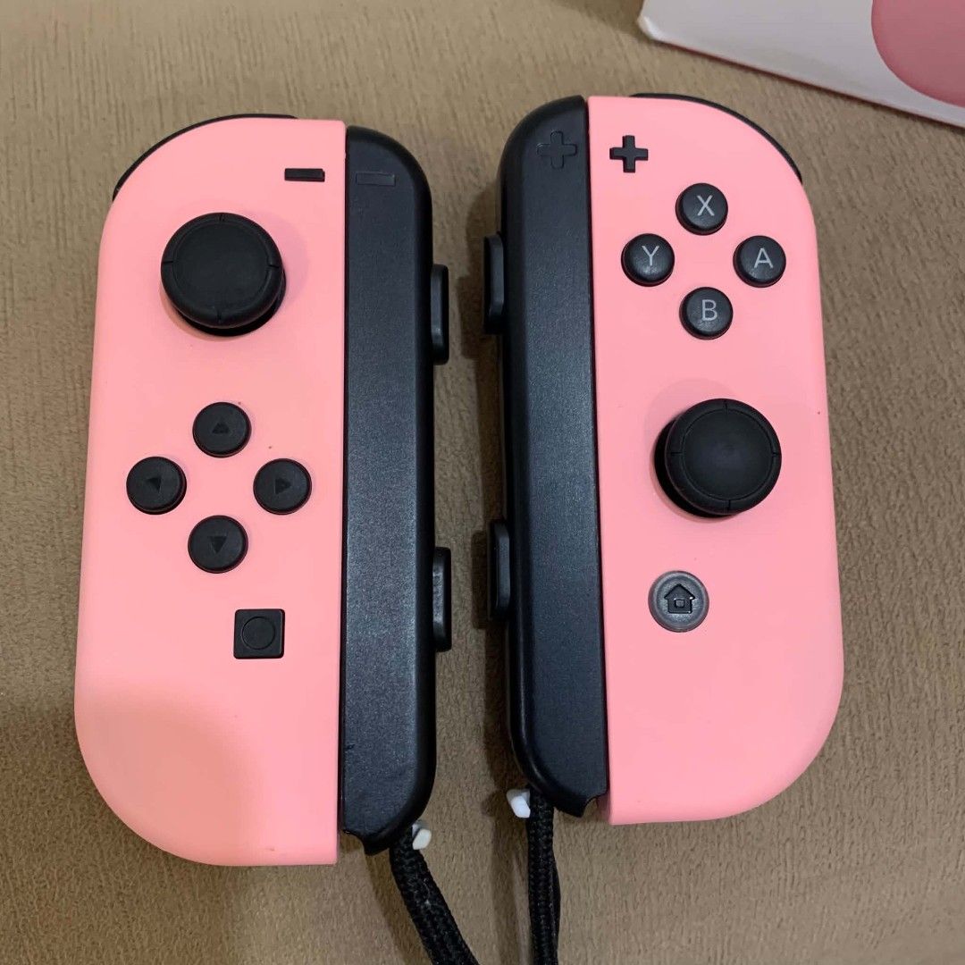 Nintendo Switch Joycon Controller Pastel Pink Switch Controller Left and Right (Category: Controllers) located in Imus. Submitted by shavogamingph (Listing ID 1468249712, Image 3). Description: ‎✅ Item in good condition ‎✅ No issue Nintendo Switch Joycon Controller Pastel Pink Price 2195 ‎ ‎📍 Imus Cavite ‎ ‎Pick up/ Meetup ‎Lalamove/ LBC ‎ ‎🛵 Available for COD ‎.