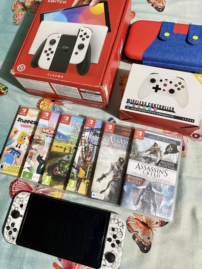 Nintendo Switch OLED (Category: Nintendo) located in General Trias. Submitted by eddd14 (Listing ID 1468245983, Image 1). Description: For Sale Nintendo Switch Oled White Complete Original Accessories with Box 📦 • Nintendo Switch OLED console • Dock • Joy-Con Controllers (L & R) • Joy-Con Grip • Joy-Con Straps • Original Charger • HDMI Inclusions: -128GB SD Card -Mario Carrying Case -NS1 Wireless Controller -2 Pairs Thumb Grip Caps -Tempered Gla