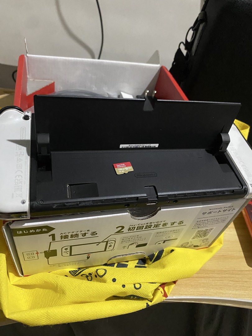 Nintendo Switch OLED (White) 128gb - Complete set w/ freebies (Category: Nintendo) located in Makati City. Submitted by keenhorse.29c176 (Listing ID 1468153145, Image 2). Description: ₱12,000 - Bought Dec 2024 - Like new po, not abused - Everything complete po and original pati ung box - No issues po, no stick drift, not banned on e-shop, (very small hairline on screen protector di po sa mismong OLED screen) - 64gb internal storage + 128gb Sandis