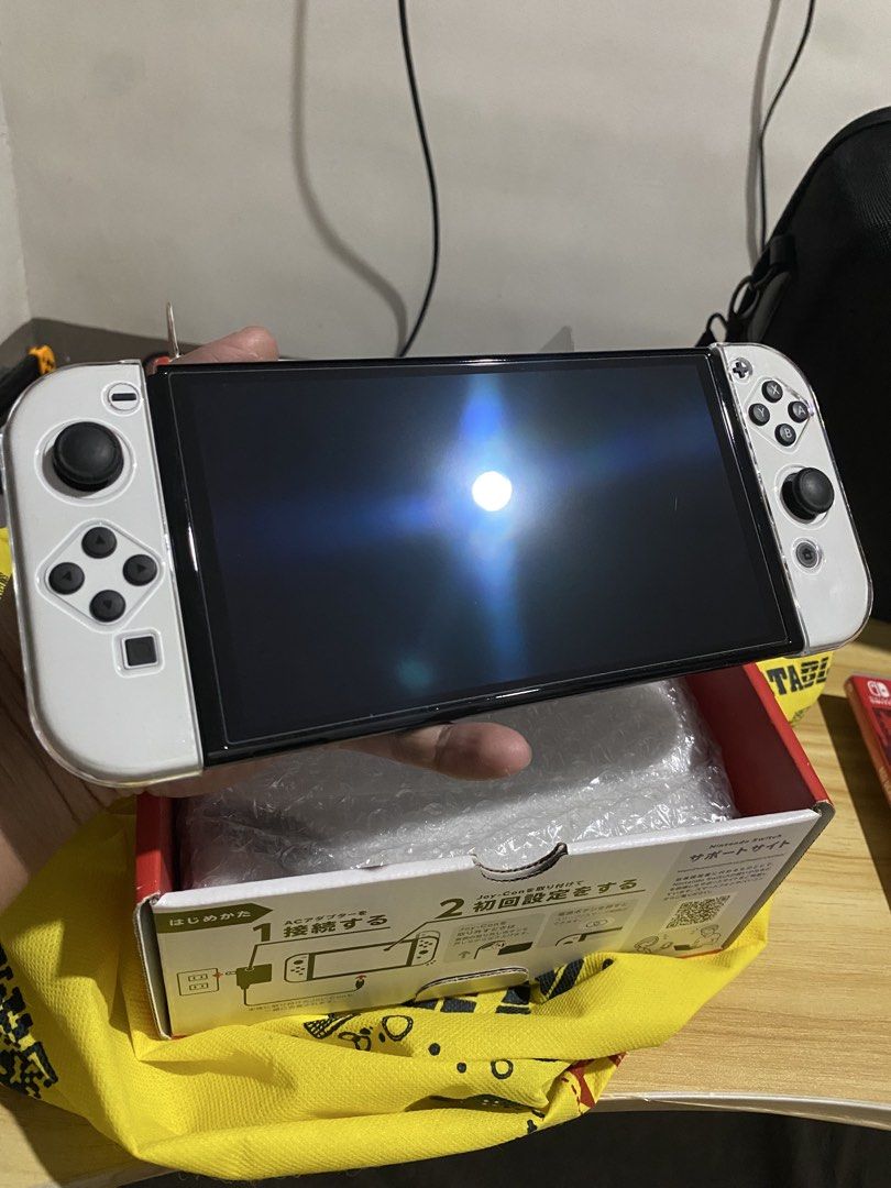 Nintendo Switch OLED (White) 128gb - Complete set w/ freebies (Category: Nintendo) located in Makati City. Submitted by keenhorse.29c176 (Listing ID 1468153145, Image 3). Description: ₱12,000 - Bought Dec 2024 - Like new po, not abused - Everything complete po and original pati ung box - No issues po, no stick drift, not banned on e-shop, (very small hairline on screen protector di po sa mismong OLED screen) - 64gb internal storage + 128gb Sandis