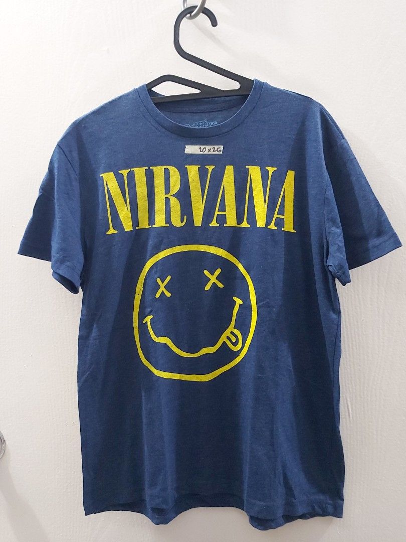 Nirvana shirt (Category: Tshirts & Polo Shirts ) located in Mandaluyong City. Submitted by fun_demonium (Listing ID 1468097065, Image 1). Description: About: - Large (20 x 26 inches) - No Issues - Personally owned / Not thrifted - RFS: Decluttering / Moving Payment: - Gcash / Maya / Maribank Shipment: (c/o buyer) - Lalamove / Gogoexpress / J&T.