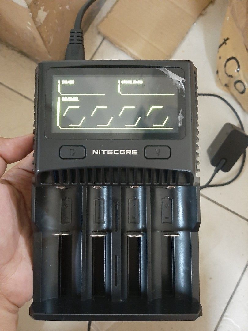 Rechargable Battery Charger ( Nitecore) (Category: Batteries & Chargers) located in Manila. Submitted by villamante56249 (Listing ID 1468209358, Image 3). Description: - Model: Nitecore SC4 Superb Charger - Condition: Fully functional and tested - Display: High-definition color LCD screen for real-time charging parameters - Charging Speed: Up to 3000mA in a single slot with manual current selection (300mA - 3000mA) - Battery Compatibility: Suppor