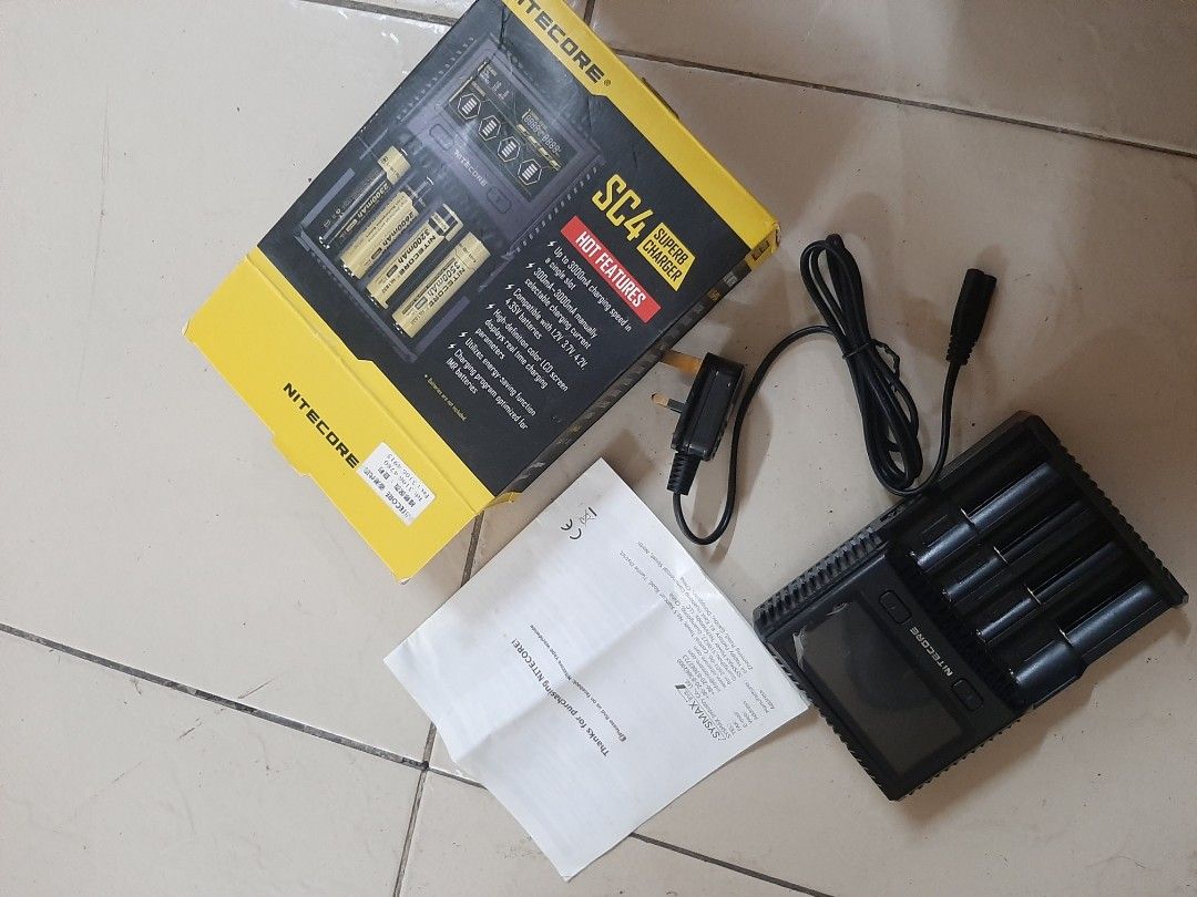 Rechargable Battery Charger ( Nitecore) (Category: Batteries & Chargers) located in Manila. Submitted by villamante56249 (Listing ID 1468209358, Image 2). Description: - Model: Nitecore SC4 Superb Charger - Condition: Fully functional and tested - Display: High-definition color LCD screen for real-time charging parameters - Charging Speed: Up to 3000mA in a single slot with manual current selection (300mA - 3000mA) - Battery Compatibility: Suppor