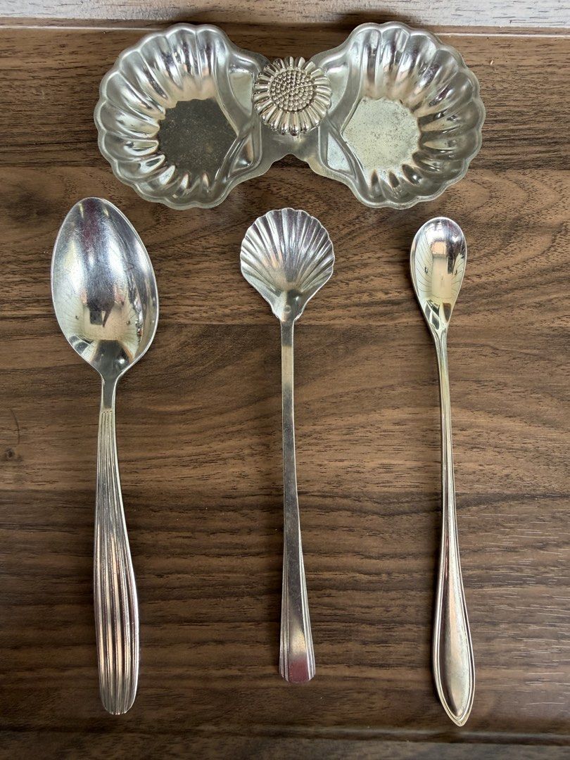 Noritake Stainless Shell Design Serving Set with Double Dish (Category: Dinnerware & Cutlery) located in Digos. Submitted by old_soul. (Listing ID 1468098866, Image 1). Description: - Authentic Noritake stainless steel set - Features a unique double seashell-shaped serving dish joined by a sunflower emblem - Includes 3 matching spoons: 1 large serving spoon, 1 shell-shaped spoon, and 1 long-handled spoon - Stainless stamp on the back for authenti