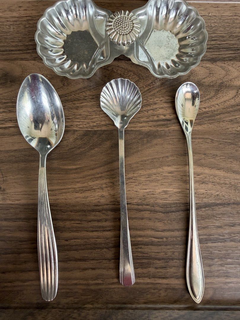 Noritake Stainless Shell Design Serving Set with Double Dish (Category: Dinnerware & Cutlery) located in Digos. Submitted by old_soul. (Listing ID 1468098866, Image 3). Description: - Authentic Noritake stainless steel set - Features a unique double seashell-shaped serving dish joined by a sunflower emblem - Includes 3 matching spoons: 1 large serving spoon, 1 shell-shaped spoon, and 1 long-handled spoon - Stainless stamp on the back for authenti