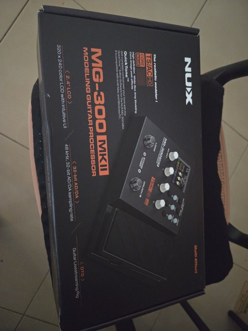 NUX MG-300 MKII Modeling Guitar Processor (Category: Musical Instruments) located in Makati City. Submitted by nategz (Listing ID 1468207978, Image 1). Description: NUX MG-300 MKII modeling guitar processor. White-box amp modeling, 32-bit AD/DA sampling rate, color LCD display, and built-in expression pedal. Includes original product box and adapter. Clean unit, fully functional. Great for practicing at home or recording straight into your comput