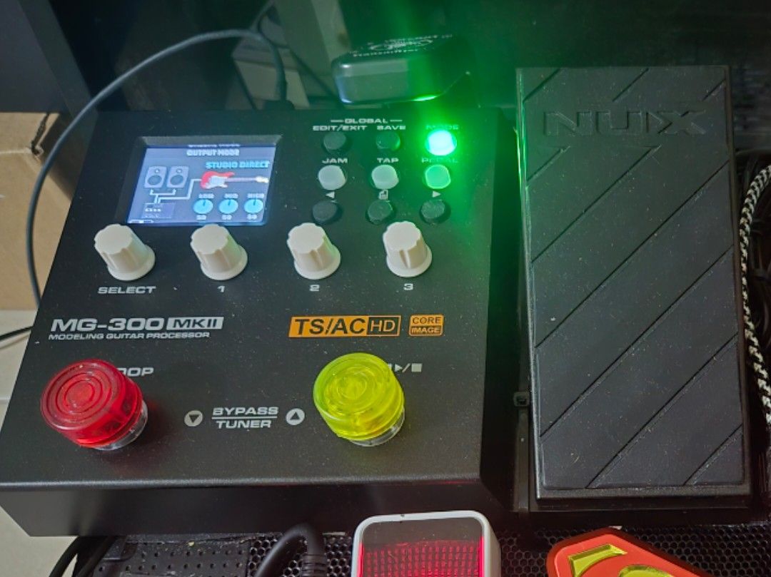 NUX MG-300 MKII Modeling Guitar Processor (Category: Musical Instruments) located in Makati City. Submitted by nategz (Listing ID 1468207978, Image 2). Description: NUX MG-300 MKII modeling guitar processor. White-box amp modeling, 32-bit AD/DA sampling rate, color LCD display, and built-in expression pedal. Includes original product box and adapter. Clean unit, fully functional. Great for practicing at home or recording straight into your comput